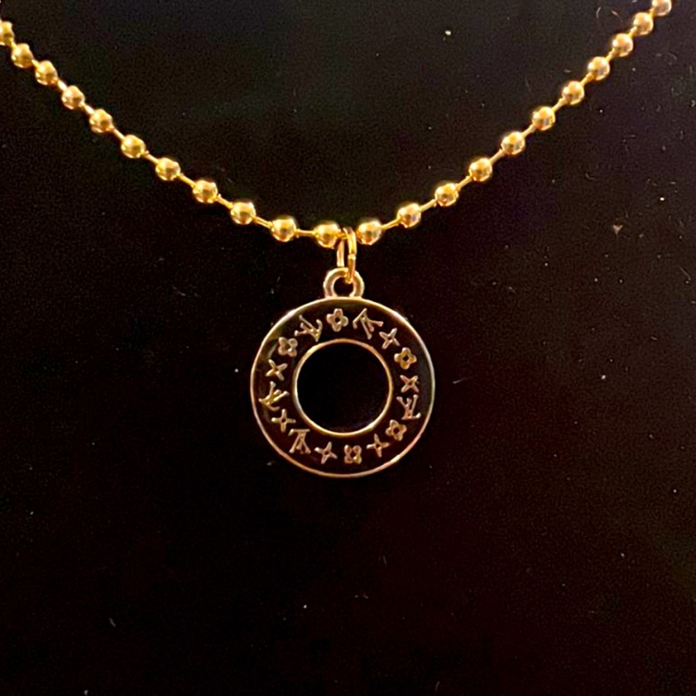 (SOLD!!!) 
Authentic LV Black/Gold Circle Charm on Necklace